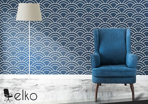 Blue chair against patterned wall