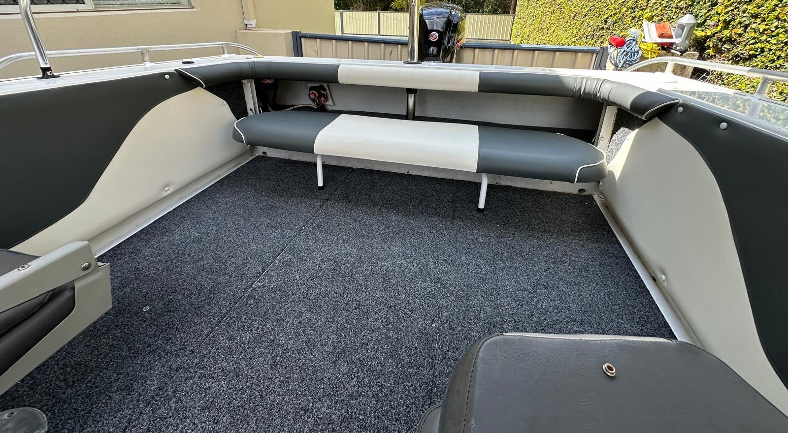 Empty boat interior with seating area
