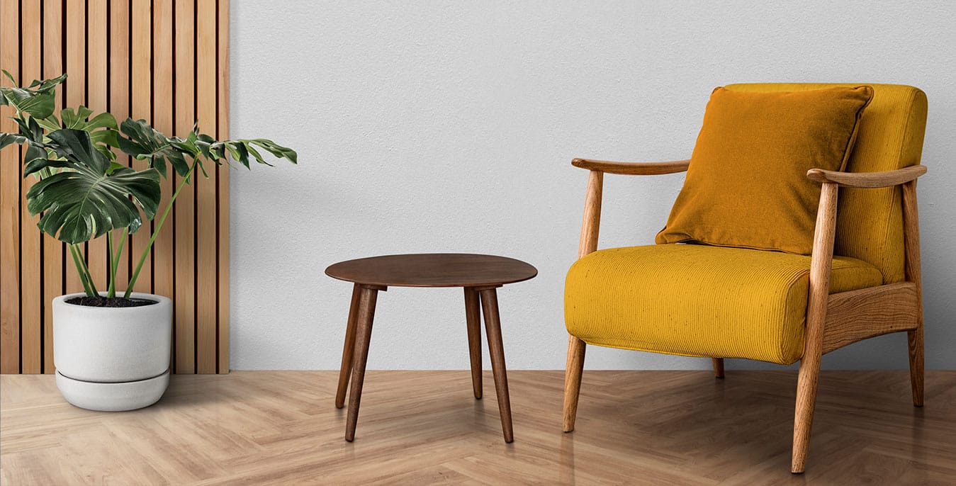 Modern chair, table, and plant.