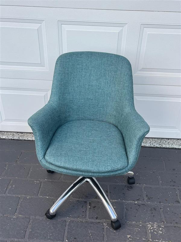 Turquoise office chair on wheels