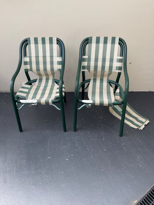 Two striped chairs, one damaged.